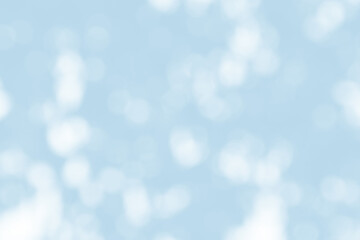 Abstract light blue blur bokeh for background, light blur on high light blue gradient abstract background in central design for presentation.