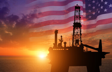 US oil industry .Crude oil and petroleum concept. American flag background