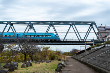Fototapeta na wymiar 相模川に架る鉄道橋の風景
