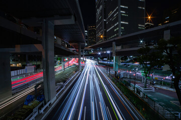 Fototapeta na wymiar A night neon street in Roppongi wide shot