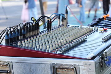 Button of the audio mic control. Close-up detail of equalizer mixer knobs or old fashioned audio...