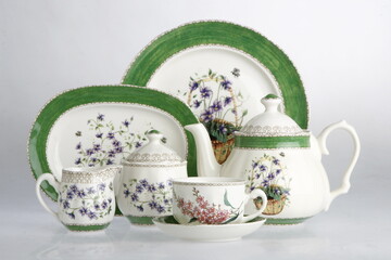 Ceramic tea party set in green and purple, flower design
