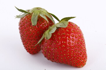 Pair of fresh and plump strawberries