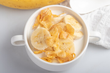 Cornflakes breakfast, banana, fresh milk, healthy food