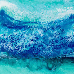 Obraz na płótnie Canvas Epoxy resin art with turquoise and blue colors. Resin effect background