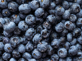 Blueberries floating. Fresh blueberries background with copy space for your text. Vegan and vegetarian concept.Texture blueberry berries close up.