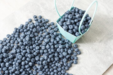 large blueberry with paper basket