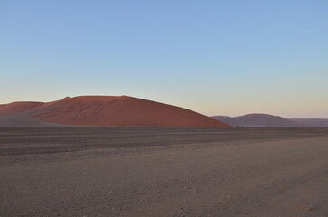 Fototapeta na wymiar Sunset at namib desert dry pan of Sossusvlei Namib Naukluft National Park