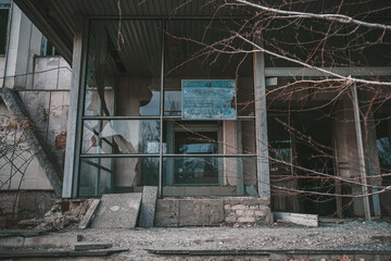 City center of Pripyat, Chernobyl region, Ukraine, exclusion zone, A piece of the inscription "complex" on a sign at the entrance