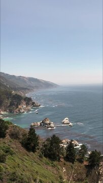 Panning shot of the coastline in the Big Sur along Highway 1, California.
