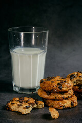 a glass of milk and a stack of biscuits