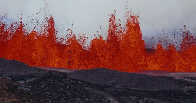 Hot lava and magma erupting out of the Hawaii Mauna Loa volcano eruption of 2022,  Shot on RED