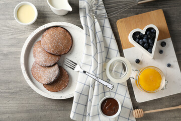 Concept of sweet food, chocolate pancakes, top view