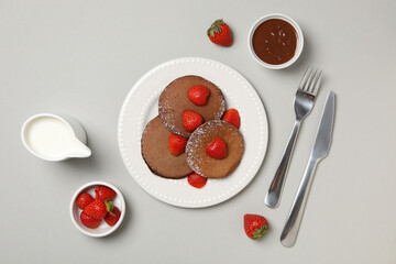 Concept of sweet food, chocolate pancakes, top view