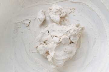 dried white clay in a bowl