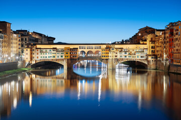 Fototapeta premium Florence, Italy at the Ponte Vecchio Bridge crossing the Arno River