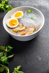 soup rice noodles funchose, egg, mushrooms Pho Bo delicious snack healthy meal food snack on the table copy space food background rustic top view