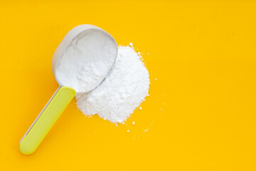 Baking soda on blue background.