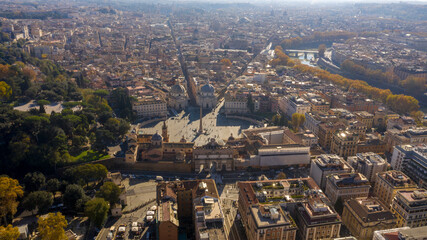 Aerial view of Piazza del Popolo, a large urban square, near the Villa Borghese gardens and the Pincio terrace in Rome, Italy. In the square there is the Flaminio Obelisk known as Popolo Obelisk.