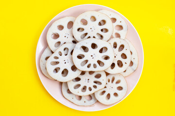 Lotus root on yellow background