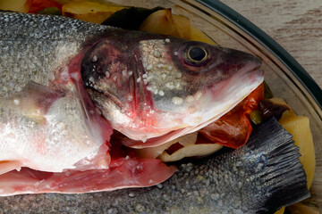 Close-up photo of fresh sea bass prepared for baking