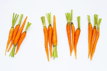 Fresh carrots on white background.