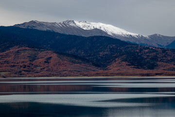 beautiful landscape with lake and mountains in the background