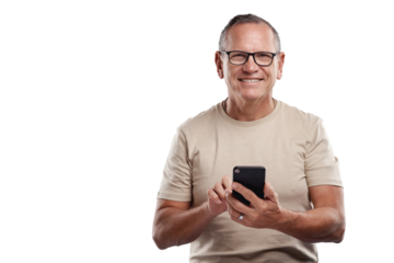 PNG shot of a handsome mature man standing alone against a grey background in the studio and using his cellphone