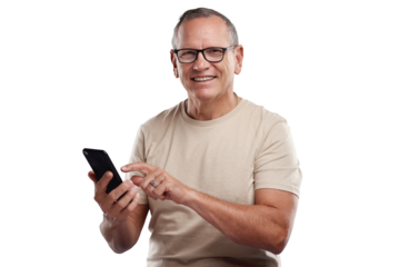 PNG shot of a handsome mature man standing alone against a grey background in the studio and using his cellphone