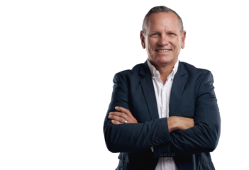 PNG shot of a handsome mature businessman standing alone against a grey background in the studio with his arms folded