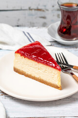 Cheesecake. New York cake. Raspberry cheesecake on wood floor background. close up