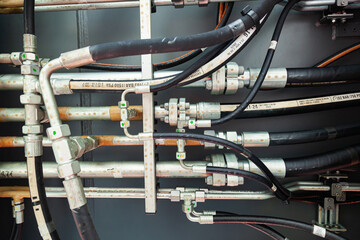 High pressure hydraulic hose system connected with steel pipes and connected to the system,...