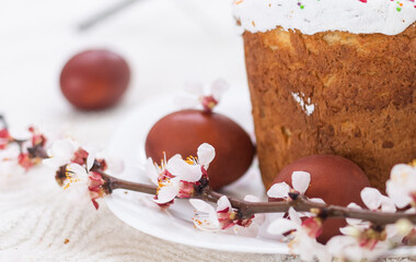 Easter cake and colored eggs. Traditional Easter baking. Easter holiday. Close-up.