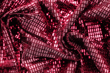 Sequins close-up macro. Abstract texture background with sequins. Color of the year 2023 - Viva...