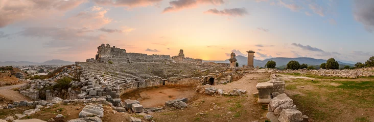 Foto op Canvas Xanthos Ancient City. Grave monument and the ruins of ancient city of Xanthos - Letoon in Kas, Antalya, Turkey at sunset. Capital of Lycia. © mitzo_bs