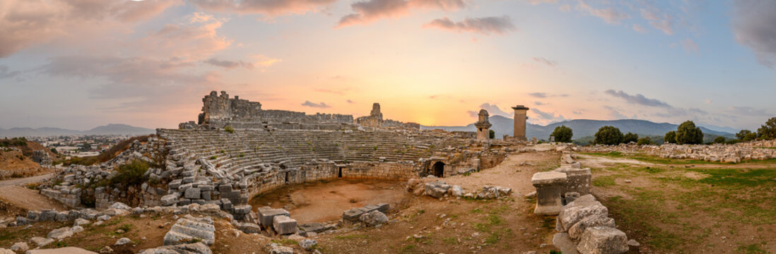 Xanthos Ancient City. Grave monument and the ruins of ancient city of Xanthos - Letoon in Kas, Antalya, Turkey at sunset. Capital of Lycia.