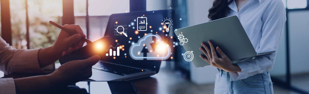 man use Laptop with cloud computing diagram show on hand. Cloud technology. Data storage. Networking and internet service concept.