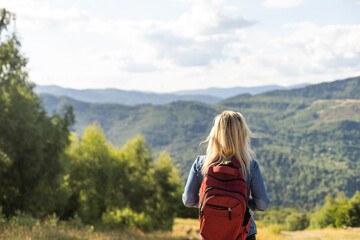 Fototapeta na wymiar young woman hiking in Carpathian Mountains
