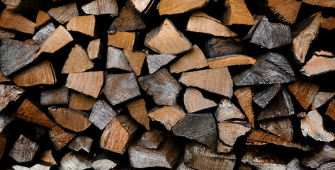 Background of cutting firewood blanks for the fireplace. Texture background