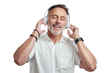 Poster PNG studio shot of a mature man wearing headphones against a grey background © Heyt/peopleimages.com