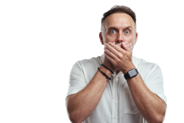 PNG studio portrait of a mature man covering his mouth and looking shocked against a grey background