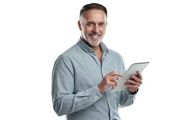 PNG studio portrait of a mature man using a digital tablet against a grey background