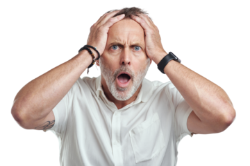 PNG studio portrait of a mature man looking surprised against a grey background
