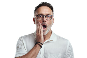 PNG studio portrait of a mature man looking surprised against a grey background