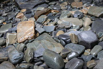 Sea pebbles close up background, copy space