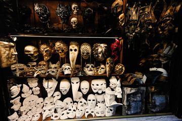 Venetian masks in store display in Venice, Italy.