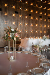 Boho wedding decor. Wedding centerpieces arrangements with dried flowers floristry and candles, boho style.