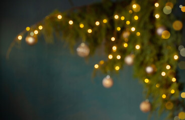 Christmas tree branches with lights out of focus
