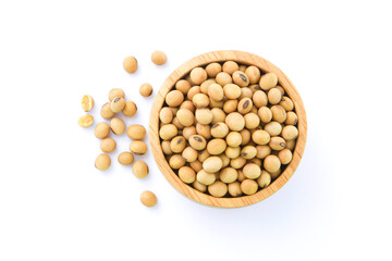 Soybean seeds in wooden bowl isolated on white background , top view , flat lay.
