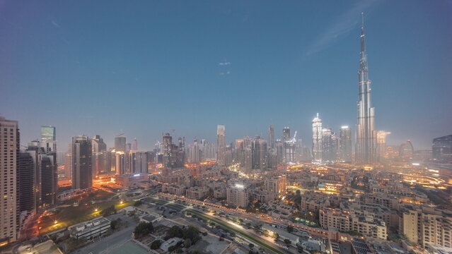 Dubai Downtown night to day timelapse with tallest skyscraper and other towers © neiezhmakov
